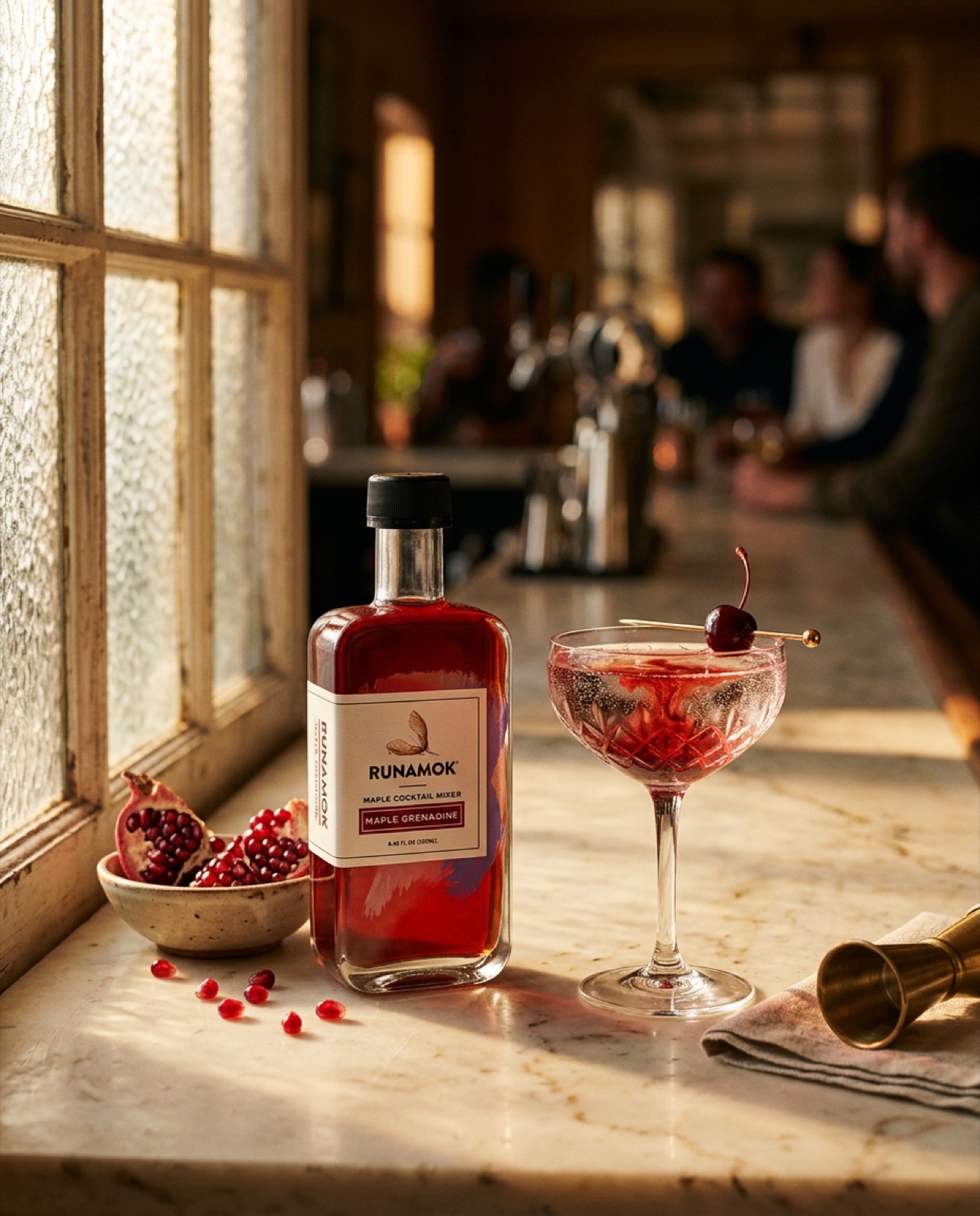 Runamok Maple Grenadine cocktail with pomegranate and cherry garnish at a bar