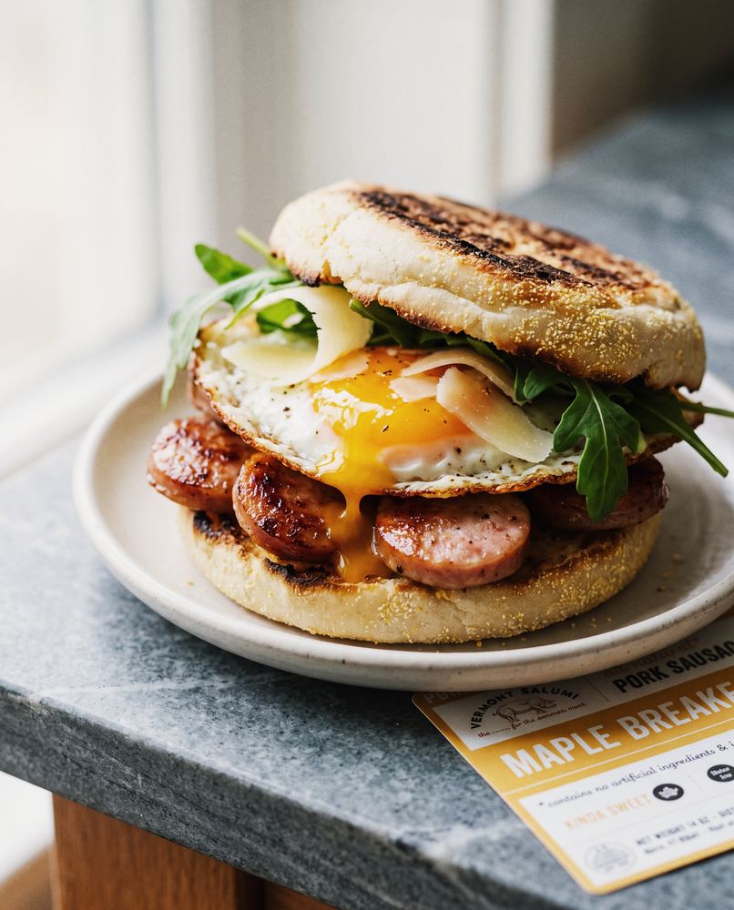 Vermont Salumi maple breakfast sausage sandwich with fried egg and arugula