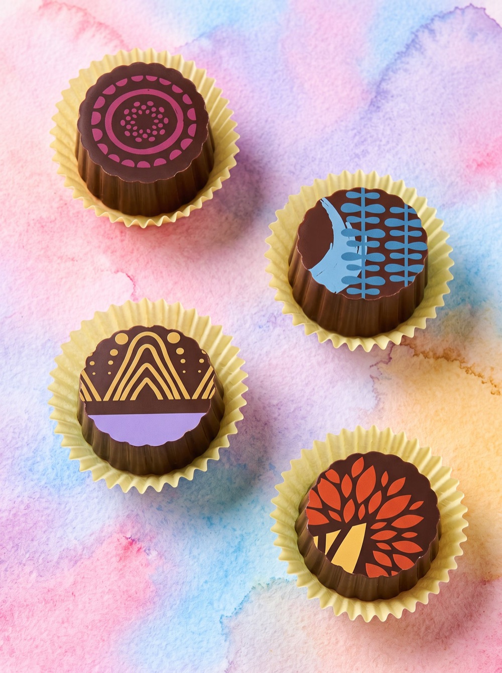 Birnn Chocolates Artisan box of four on a soft watercolor wash