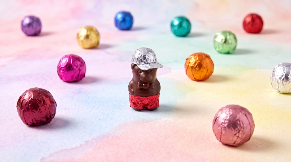 Birnn Chocolates molded chocolate bear with foil-wrapped truffles