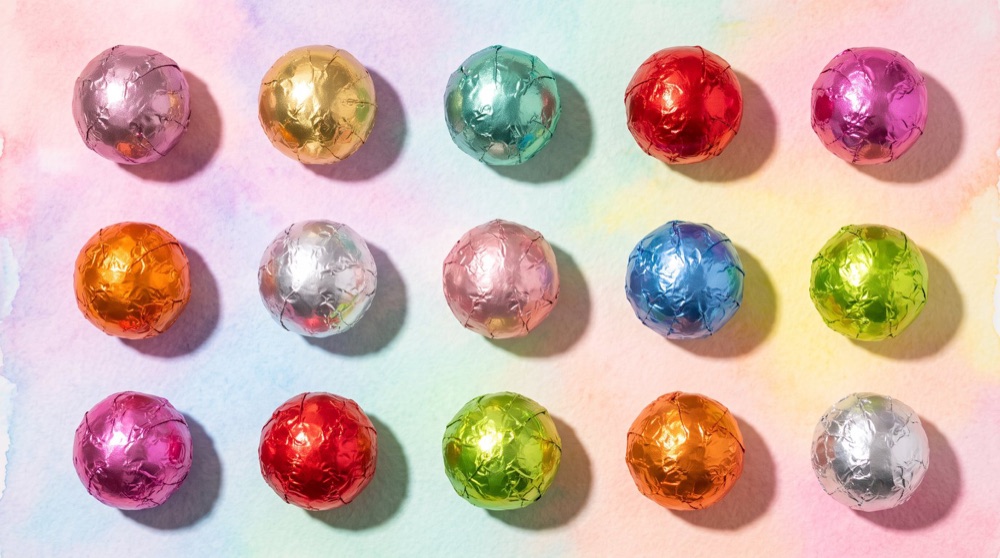 Birnn Chocolates foil-wrapped truffle grid, overhead view
