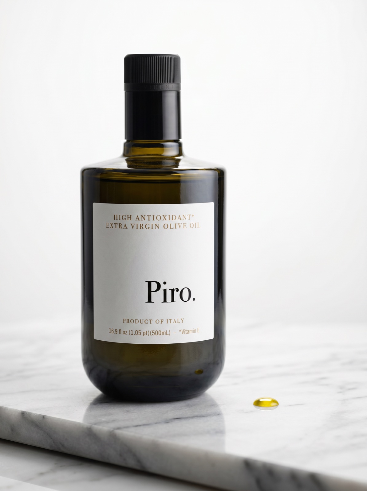Olio Piro extra virgin olive oil on marble