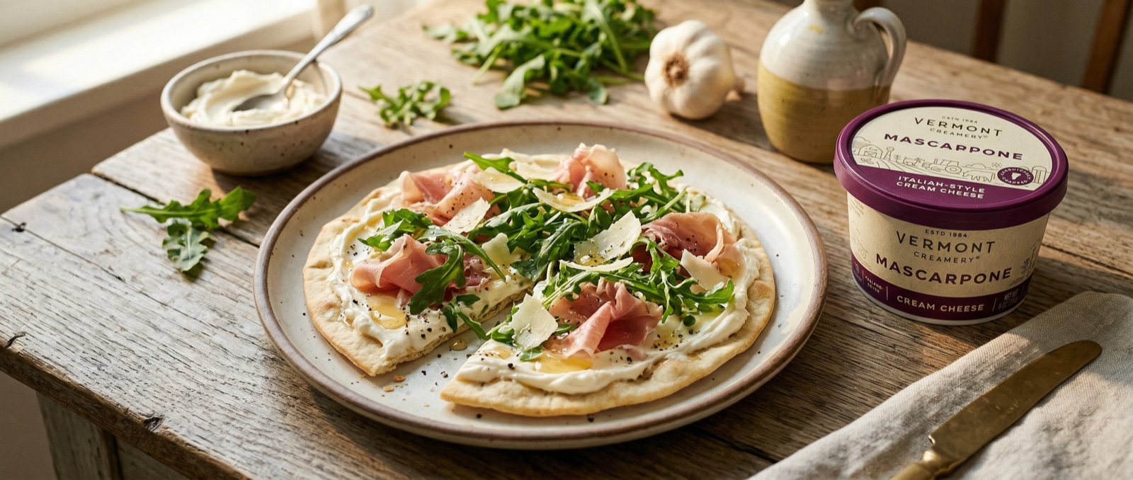 Vermont Creamery Mascarpone flatbread with prosciutto and arugula